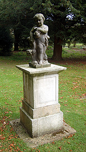 Statue of an infant holding fruit September 2011